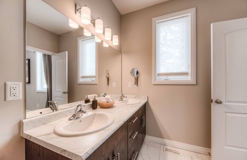 Rosemount House | modern master bedroom with private bathroom