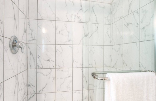 Rosemount House | modern master bedroom with private bathroom