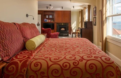 Astoria Hotel | Modern Meets Victorian: Room w/Handcrafted Cabinetry & Heated Tile Floors