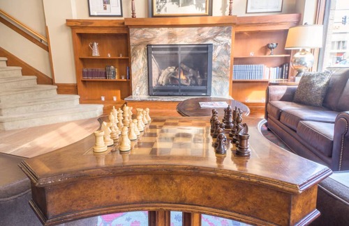 Astoria Hotel | Modern Meets Victorian: Room w/Handcrafted Cabinetry & Heated Tile Floors