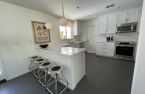 Araby House | Modern midcentury home Palm Springs with heated pool