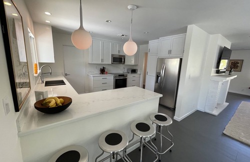 Araby House | Modern midcentury home Palm Springs with heated pool