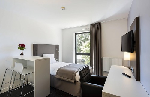 Dijon Hotel | Modern Mini-Apartment with Kitchen Amenities & Peaceful Surroundings
