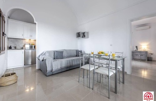 Megalochori Apartment | Modern Naya Escape in Santorini with Captivating Sea Views