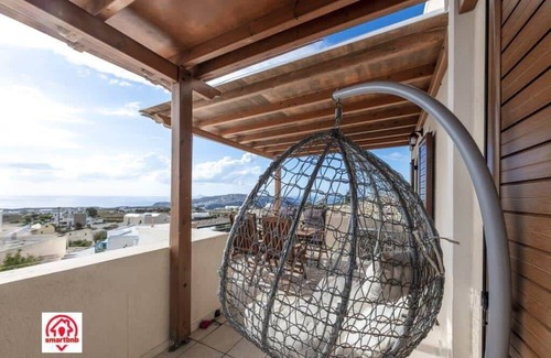 Megalochori Apartment | Modern Naya Escape in Santorini with Captivating Sea Views