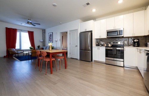 Downtown Louisville Apartment | Modern Nulu 2BR CozySuites 03