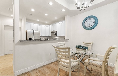 Pelican Condo | Modern Oasis pool paradise