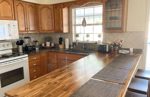 Sarasota Springs House | Modern Oasis with Heated Pool near Siesta Key Beach and a Downtown 3BR/@BA