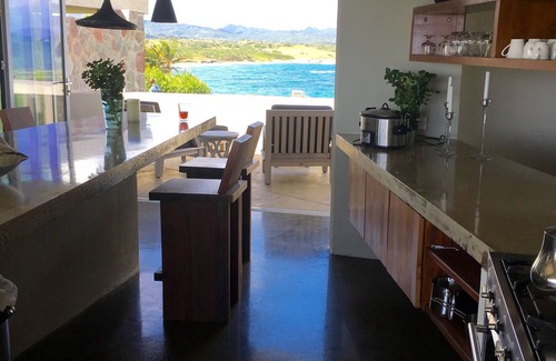 Micoud Villa | Modern Oceanfront Home with Pool, Outdoor Showers and Private Tennis Court