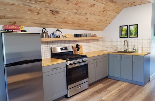 Houghton Apartment | Modern Off-grid Studio Loft on Farmstead in Houghton