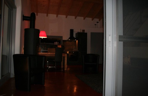 Roth House | Modern, panoramic windows with views of nature, fireplace, sauna