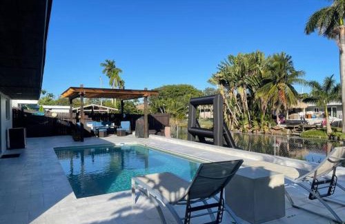 Davie Villa | Modern pool home on the lake near Hardrock FLL airport