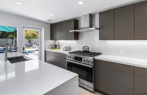 Warm Sands House | Modern Posh – Mid-Century Oasis with Pool, Spa, Game Yard & Mountain Views