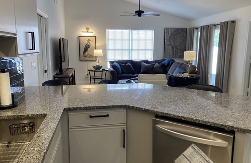 Vero Beach House | MODERN RETREAT: 2/2, w/private study, garage, screened patio, and front porch.