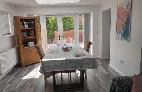 Winshill Apartment | Modern Retreat Near Town & Nature with Stunning Views Entertainment and Parking