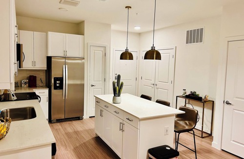 East MLK Apartment | Modern Retreat with Private Bath & Resort-Style Amenities Near Downtown