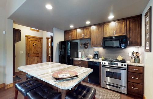 Tamarack Resort Cottage | Modern ski-in/ski-out cottage with gas grill & outdoor fire with log seats