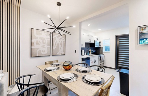 Poinsettia Heights House | Modern smart-home villa w/private backyard & fully equipped kitchen