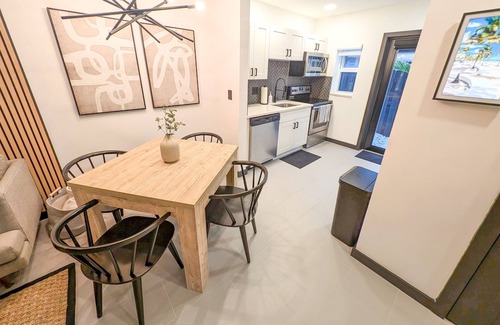 Poinsettia Heights House | Modern smart-home villa w/private backyard & fully equipped kitchen