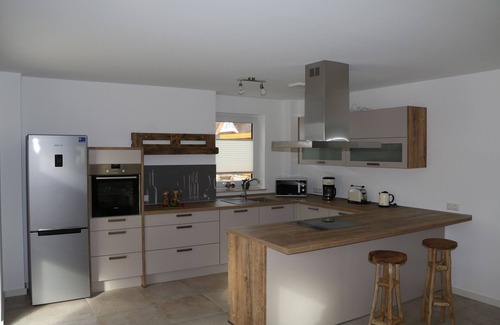 Poseritz House | Modern, spacious holiday home under thatch with fireplace, sauna, WiFi and. water nearby