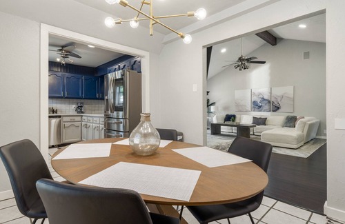 South Tulsa House | Modern space in south Tulsa w/outdoor firepit, kitchen, turf, & string lights!
