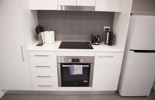 Belconnen Apartment | Modern spacious 1BDR, wifi, EV charging & parking, close to shops