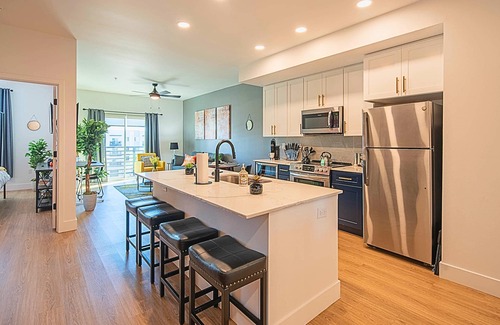 Desert View Village Condo | Modern Stay Swim Breaks In-Unit Laundry Work Desk