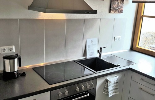 Bensheim Apartment | Modern Strata Montana vacation apartment with garden, underfloor heating and air conditioning