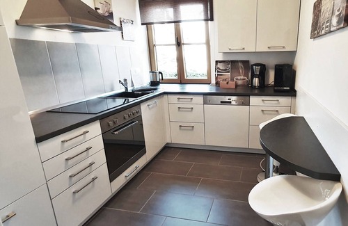 Bensheim Apartment | Modern Strata Montana vacation apartment with garden, underfloor heating and air conditioning
