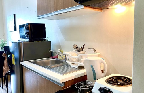 Barangay 670 Condo | Modern Studio Condominium w/Manila Bay View Sunset