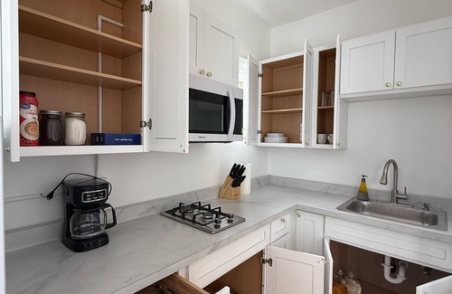 East Avenue Apartment | Modern studio in Downtown Rochester with a full kitchen and Smart TV, steps from High Falls.