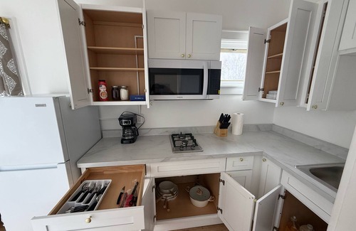 East Avenue Apartment | Modern studio in Downtown Rochester with a full kitchen and Smart TV, steps from High Falls.