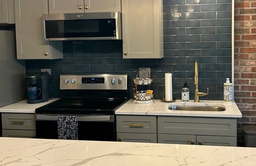East Dundee Apartment | Modern studio loft located in the heart of the Culinary District in East Dundee!