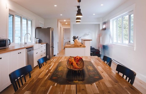 Margaree Forks House | Modern style home with spectacular views of the Margaree River.
