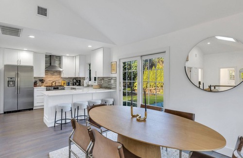 East Hampton House | Modern-style home with private pool, open-floor living plan, back porch,.