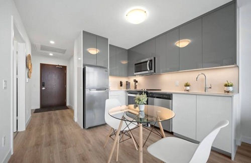 Kitchener Apartment | Modern Suite with City Views