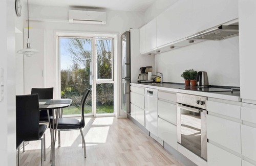 Frolunde House | Modern summer house with fantastic skylight.