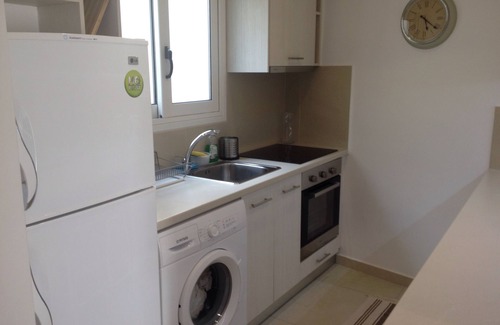 Ano Kipseli Apartment | Modern, sunny, bright downtown apartment.