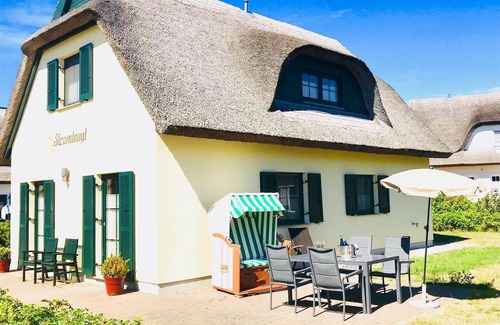 Breege House | Modern Thatched Cottage on the water with water views