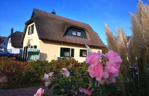 Breege House | Modern Thatched Cottage on the water with water views