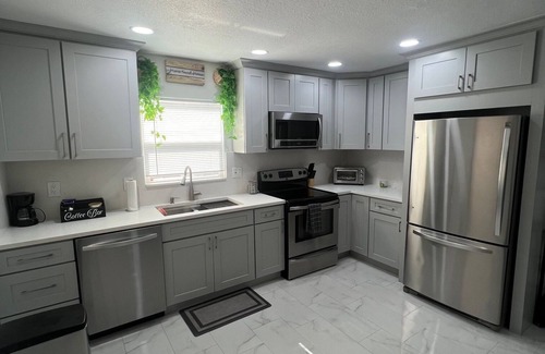 Citrus Park House | Modern tiny home with spacious backyard and pool