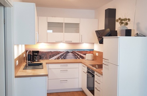 Altefaehr Apartment | Modern top floor apartment with a view of the sea and Stralsund