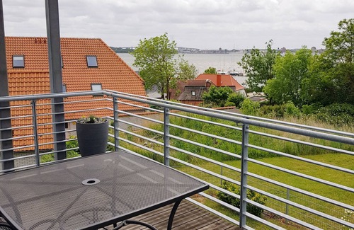 Altefaehr Apartment | Modern top floor apartment with a view of the sea and Stralsund