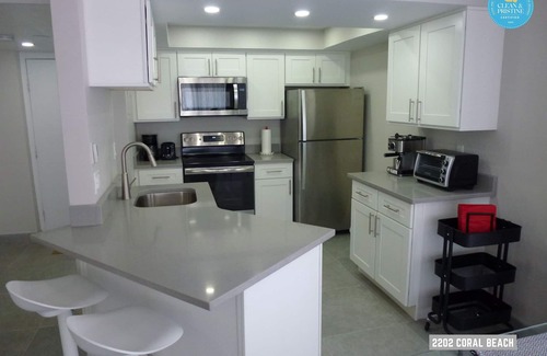 Williams Town Condo | Modern Two Bedroom with Spacious Living room on a Private Beach