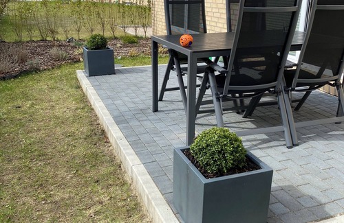 Timmendorfer Strand Apartment | Modern vacation apartment "Bikini Bottom" with garden. Dogs welcome!