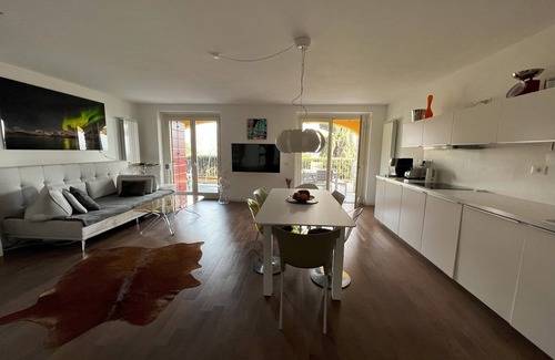 Pulciano Apartment | Modern vacation apartment with fantastic lake view, terrace, balcony & infinity pool