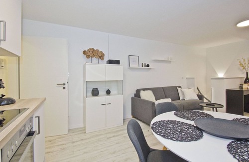 Lietzow Apartment | Modern vacation apartment with fireplace, balcony - Ferienresidenz Zwei Bodden FeWo111 -