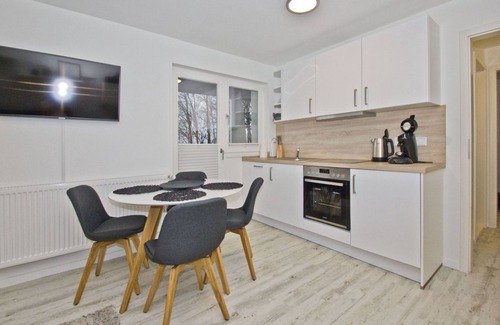 Lietzow Apartment | Modern vacation apartment with fireplace, balcony - Ferienresidenz Zwei Bodden FeWo111 -