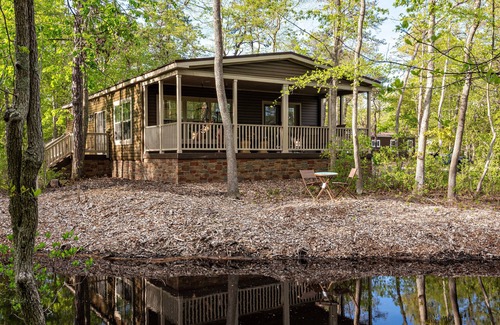 Galloway House | Modern waterfront fireplace in bedroom/bath jetted tub walk in shower no steps