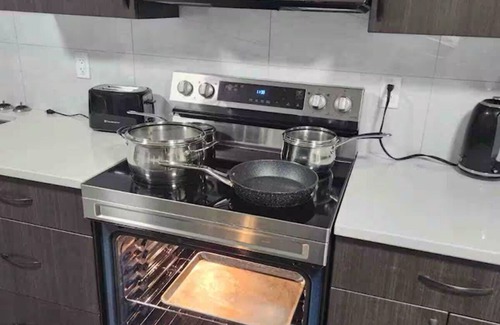 Division No. 11 House | Modern, well furnished 1 bedroom home with free street parking